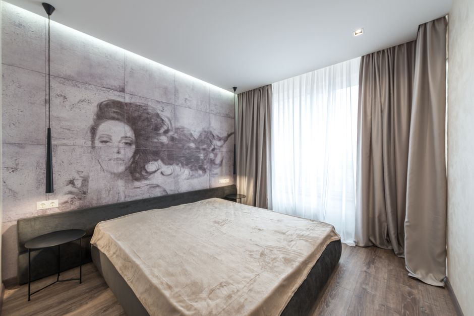 Voorbeeld van slaapkamer met fotogordijn.